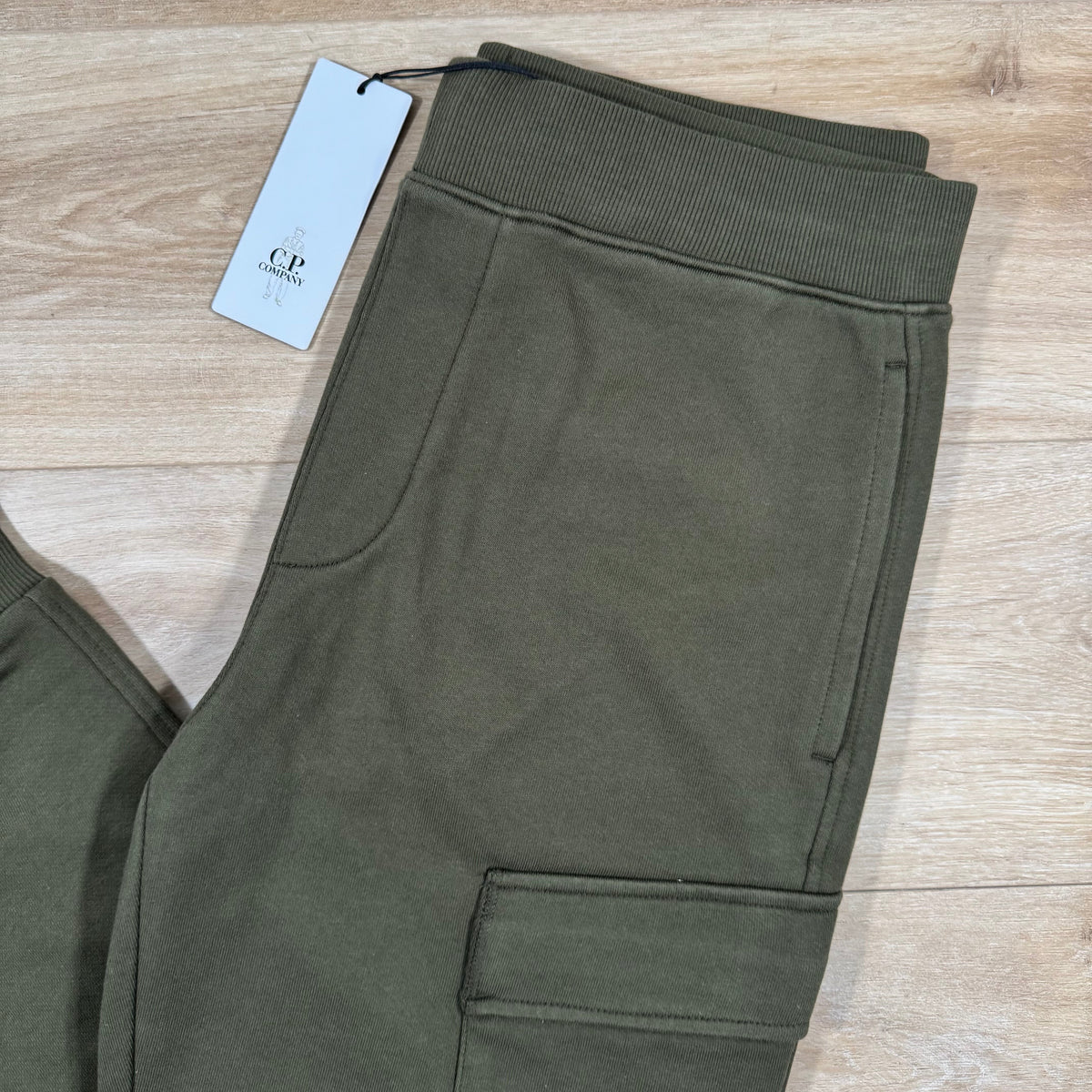 C.P. Company Diagonal Raised Fleece Lens Sweatpants in Ivy Green
