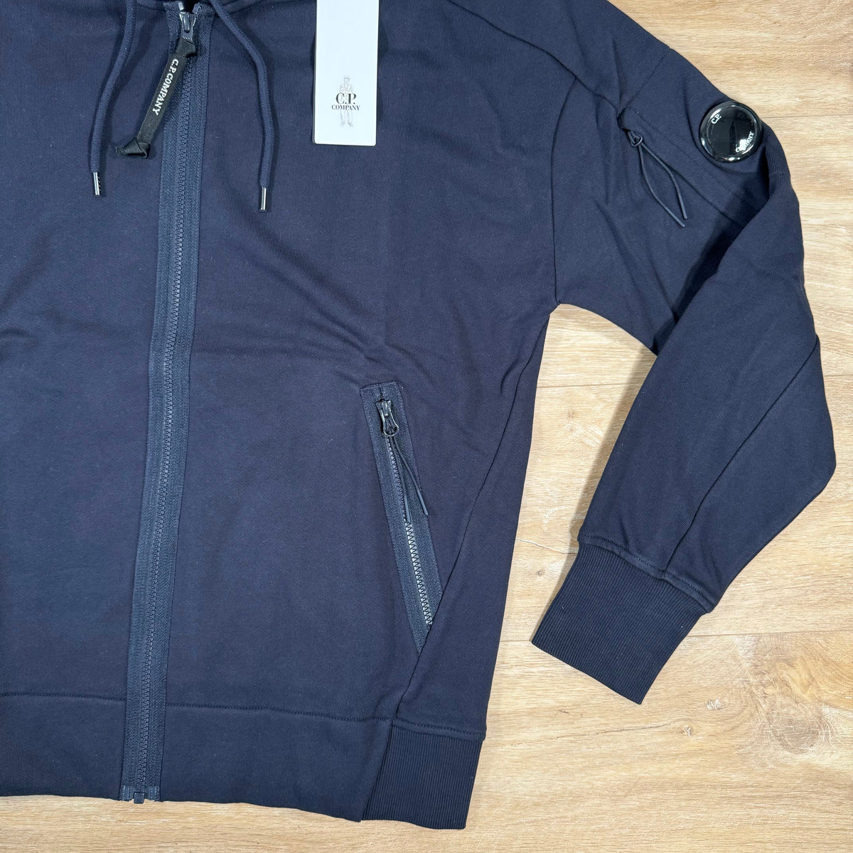 C.P. Company Diagonal Raised Zipped Lens Hoodie in Navy