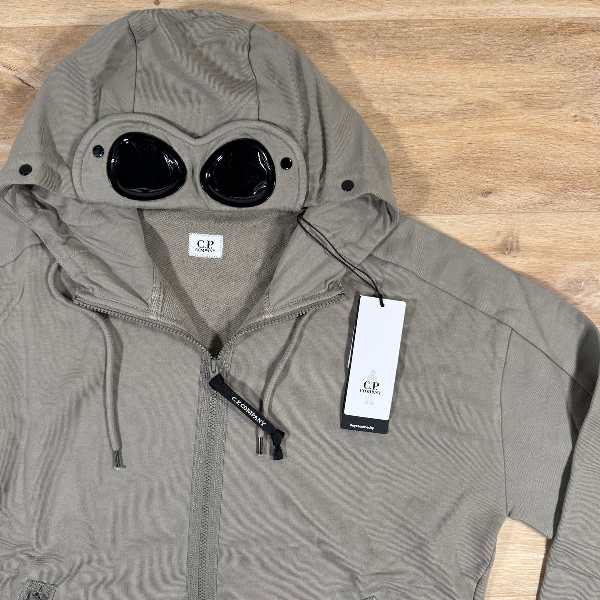 C.P. Company Diagonal Raised Fleece Goggle Hoodie in Fungi Grey