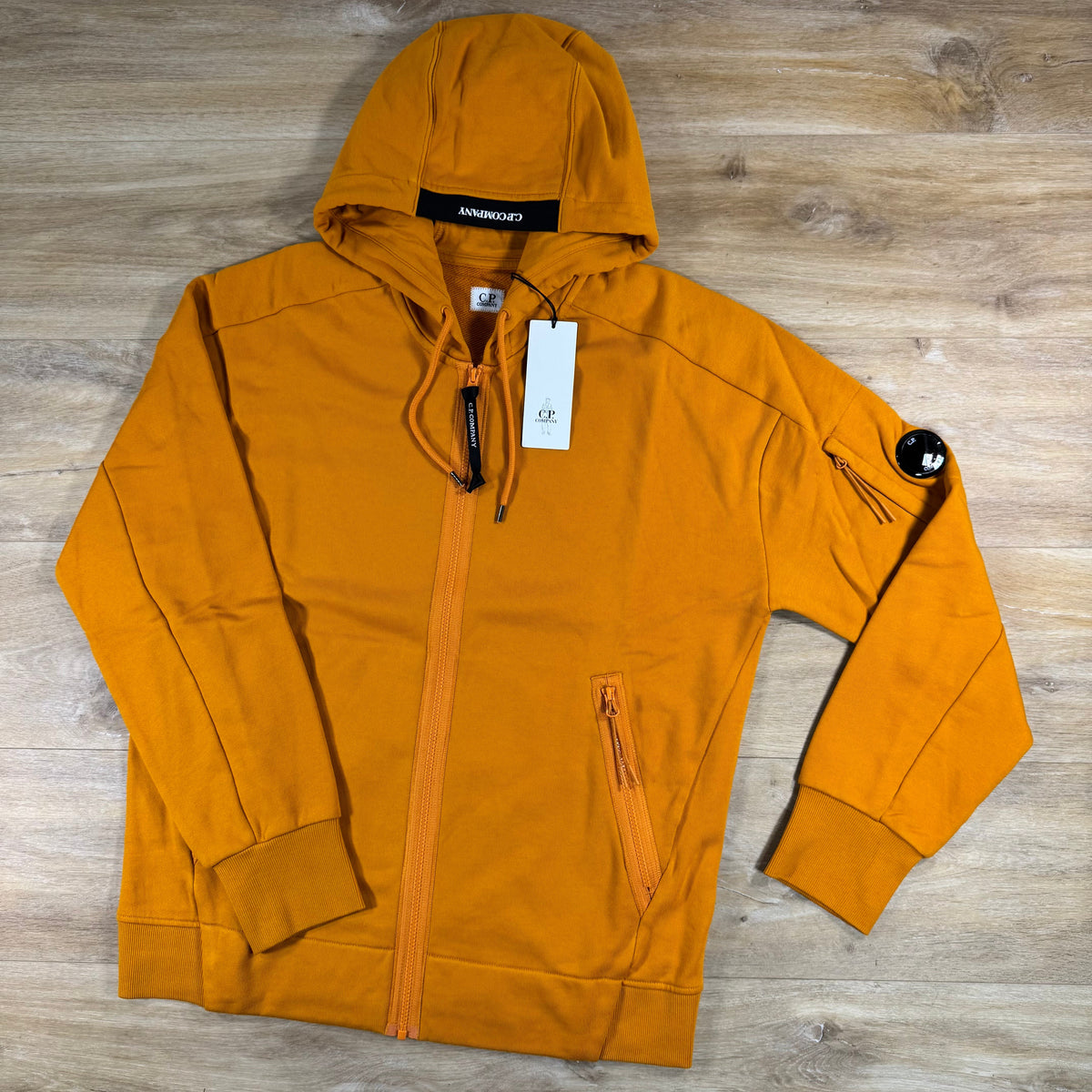 C.P. Company Diagonal Raised Zipped Lens Hoodie in Desert Sun