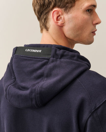 C.P. Company Diagonal Raised Fleece Lens Hoodie in Navy